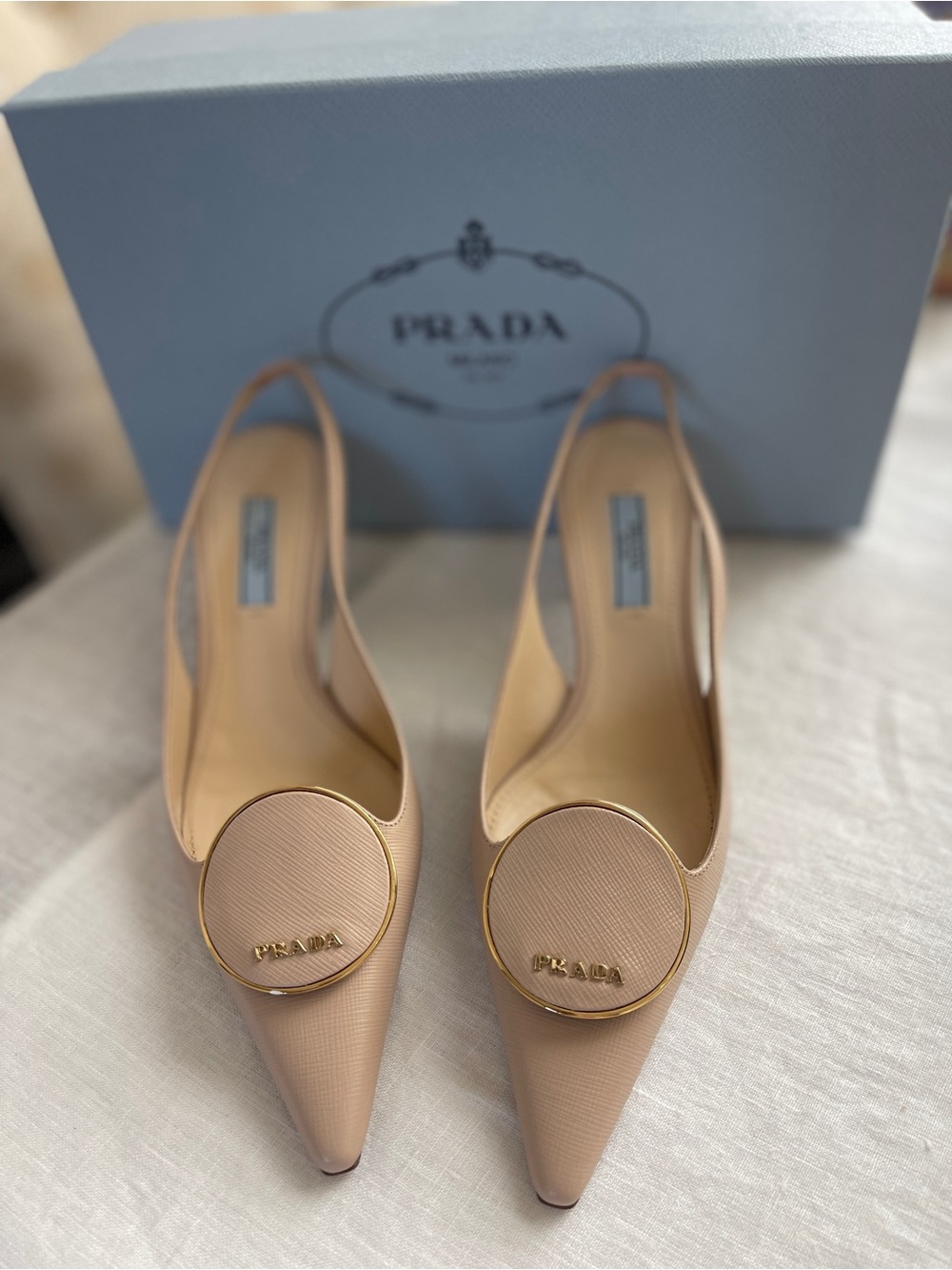 Prada Nude/Beige Pointed-Toe Slingback Pumps with Gold Logo Medallion